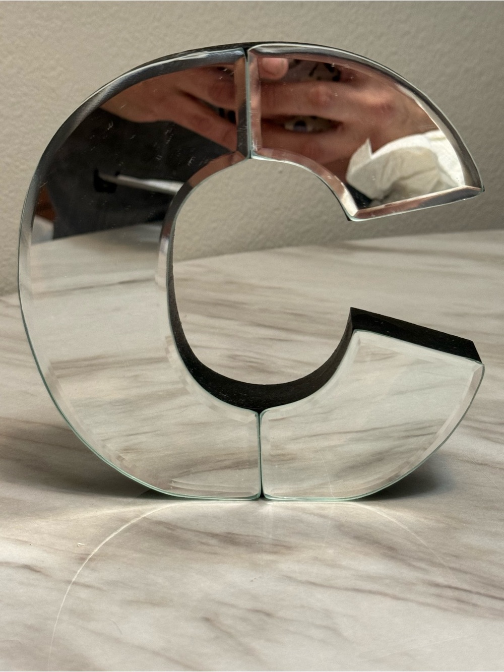Mirrored letter C